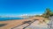 Ibiza sunshine on the waterfront in Sant Antoni de Portmany, Walk along beach or main boardwalk.