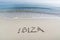 Ibiza written in sand