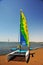 Ica Paracas Bay with its beaches and catamaran sailboat with colored sails in the Pacific Ocean of Peru