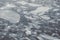 Ice blocks floating over the water of a frozen river