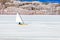 Ice-boat sailing frozen Lake Laberge Yukon Canada