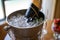 Ice bucket with bottle of chilled champagne