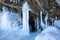 Ice cave, Icicles in the rocky caves, Lake Baikal in winter, Siberia