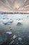 Ice Chunks at Jokulsarlon Glacial Lagoon at Sunset in Iceland