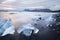 Ice Chunks at Jokulsarlon Glacial Lagoon at Sunset in Iceland