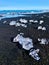 Ice Chunks Scattered on Black Sand at Diamond Beach in Iceland