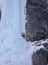 Ice climbers on a steep ice fall in the Swiss alps