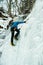 Ice climbing on a frozen waterfall