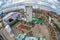 Ice climbing side-show in Sochi Olympic Park with people during Winter Olympics. Scenic fisheye aerial landscape