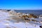 Ice coated shoreline in autumn at Lake Michigan