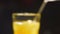 Ice coctail closeup. Rum alcohol and mango juice.