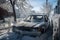 ice-covered street and car with broken windshield after blizzard