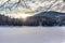 Ice covered Synevyr lake in winter, gorgeous location in Carpathian mountains