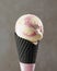 Ice cream ball in black waffle cone