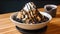 ice cream with chocolate chips and whipped cream in a bowl on wooden table