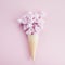 Ice cream cone with pink roses and hearts. Spring and summer Floral style. Flat lay