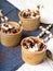 Ice cream in a cup with chocolate sauce cream rolls