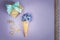 Ice cream horn or cone with purple hyacinth on a purple background with lace.