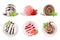 Ice cream scoops set of six different colors, decorated chocolate sauce, mint, strawberry.