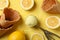 Ice cream, spoon, lemon and waffles on background, top view