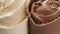 Ice cream texture background, close-up of vanilla and chocolate ice cream