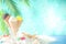 Ice cream on tropical sand background