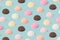 Ice cream various flavor scoops pattern on a pastel blue background.