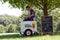 Ice Cream Vendor Waits For Customers In Park