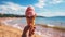 Ice creams on beach and shells with ocean landscape