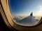 Ice crystals on airplane window during flight