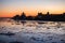 Ice drift in Northern Dvina river in Arkhangelsk, Russia. Beautiful ice motion evening silhouette citiscape