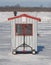 Ice fishing hut on a frozen river