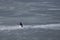 Ice fishing on river. Fisherman on frozen lake.