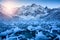 Ice flakes on scenic frozen mountain lake