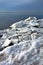 Ice Float Chunks and Frozen Pieces on Winter Shore