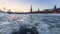 Ice floating on Moskva river in front of Kremlin wall