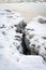 Ice floe cracking and splitting in Park Woronzof Point. Ice formations covered with snow next to Knik Arm.