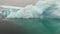 Ice floe and iceberg in ocean of Antarctica.