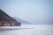 Ice floe near Listvyanka village. Winter Baikal lake landscape