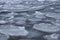 Ice floes floating in cold frozen sea water.