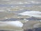 Ice floes floating on the river during the spring ice drift