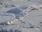 Ice floes and snow texture Winter image with a bunch of ice floes covered by a layer of snow. Snow close-up texture, just great as