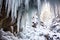 ice formations hanging from a frozen waterfall