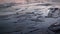 Ice is formed on the river in autumn, natural background, sunset, Ob River, Russia