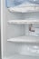 Ice in the freezer. icing cooling tubes. refrigerator requires defrosting. repair of the freezer. empty fridge, lots of ice in the