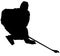 Ice hockey player in full equipment while playing ice hockey. Isolated Silhouette