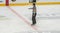 Ice hockey referee pointing decision