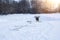 Ice hole on the surface of a frozen lake. Epiphany bathing.