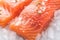 Ice kissed salmon fillets showcased in a tantalizing close up shot