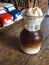 Ice latte Float, ice coffee topped with ice cream in glass on the vintage wooden table